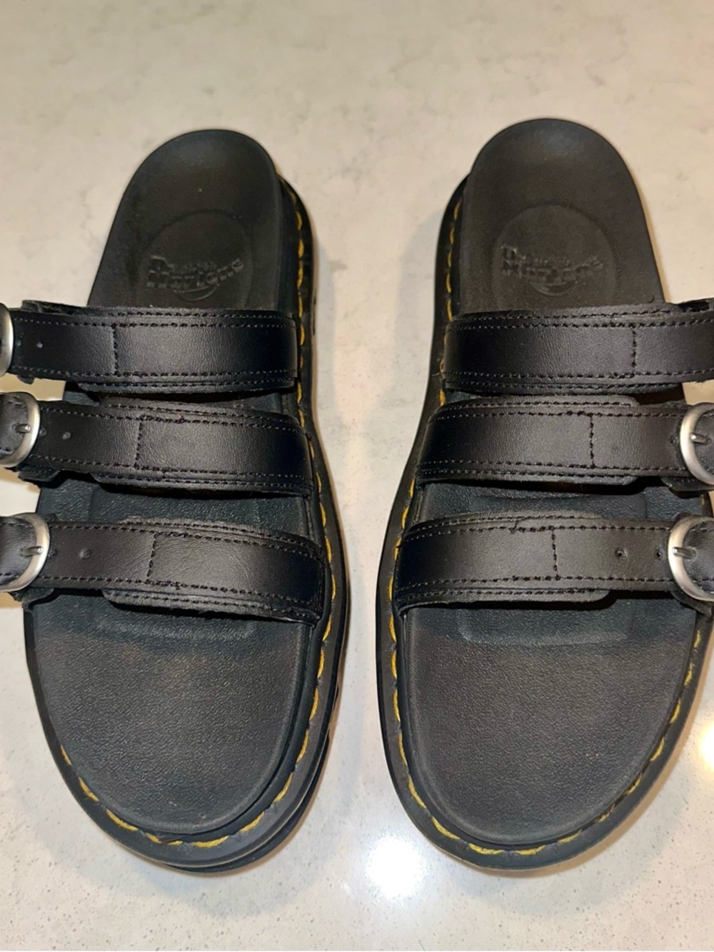 Dr. Martens Black Triple-Strap Buckle Slide Sandals with Yellow Welt